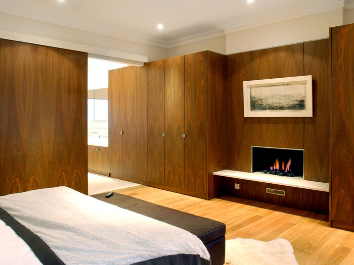 Bedrooms, Ensuites & Wardrobes — Fitted wardrobe in dark wood