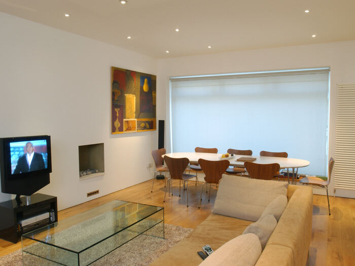 Earls Court — Living room with fireplace