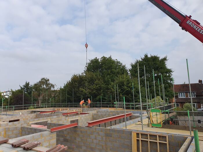 Walton Park — Steel frame going up by crane